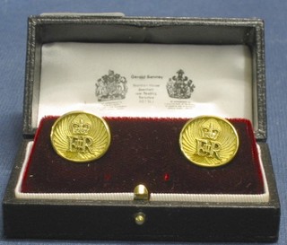 A pair of gilt metal cufflinks with Crowned Royal Cypher