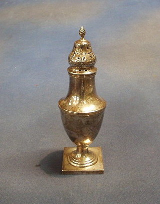 A Georgian style silver pepperette Chester 1920