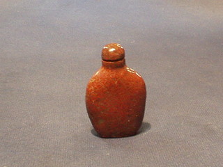 An Oriental hardstone snuff bottle and stopper 3"