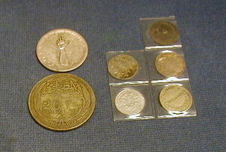 An Eastern coin dated 1916, 1 other foreign coin and 5 small silver coins