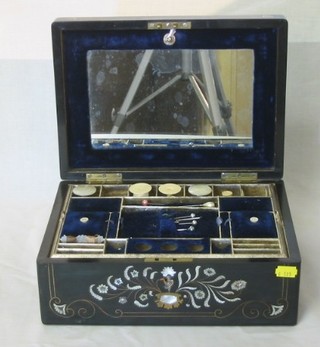 A Victorian ebonised sewing box the lid inlaid brass and mother of pearl, the hinged lid revealing a fitted interior and 6 mother of pearl cotton reels, 12"