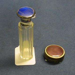 A cut glass scent phial with silver collar 3" and a circular gilt metal and enamel rouge pot 1"