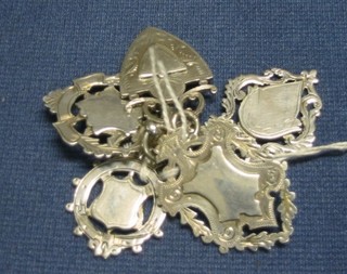 5 silver watch chain medallions