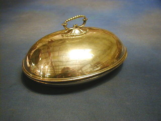An oval silver plated dish cover