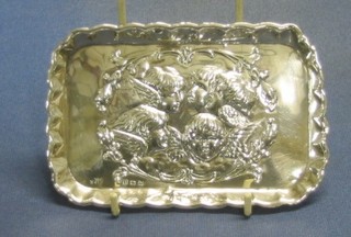 An Edwardian rectangular embossed silver pin tray decorated angels, London 1907 5 1/2", 1 ozs