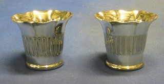 A pair of embossed silver plated waisted flower vases 3"