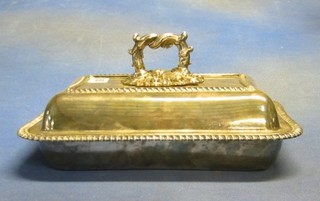 A rectangular silver plated entree dish and cover with gadroon borders