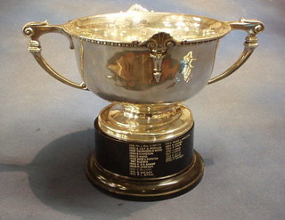 A silver twin handled trophy cup, Birmingham 1946, 26"