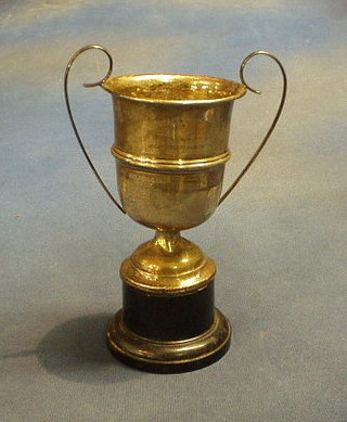 A silver twin handled trophy cup, Birmingham 1930, 2 ozs