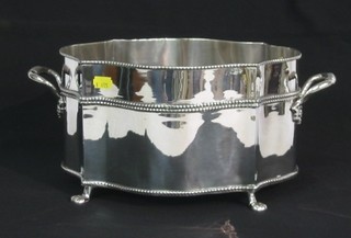 A  modern silver plated twin handled wine cooler raised on poor feet, 12"