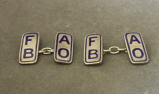 A pair of silver and enamel Ancient Order of Frost Blower's cufflinks