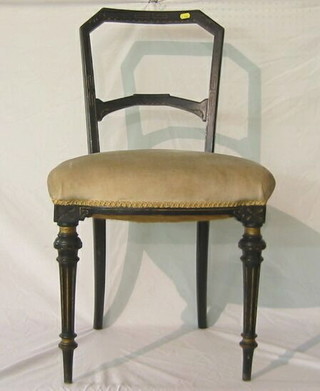 A set of 6 aesthetic movement ebonised dining chairs with shaped mid rails and upholstered seats, on turned and fluted supports