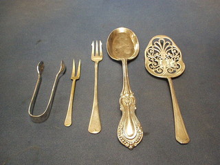 A pierced silver cake slice, Sheffield 1958, silver plated cake slice, 2 do. pickle forks and a pair of tongs