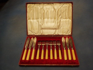 A set of 6 silver plated fish knives and forks, cased