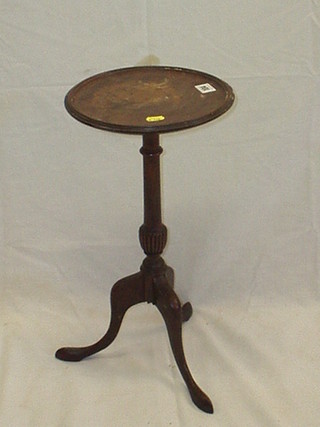 A 19th/20th Century turned mahogany wine table, raised on pillar and tripod supports 10"
