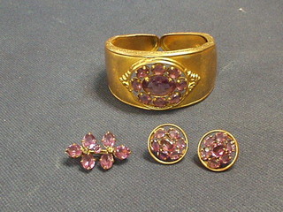 A suite of pinch beck and "amethyst" jewellery comprising pair of earrings, bar brooch and a bracelet