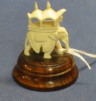 A carved ivory figure of an elephant 2 1/2"