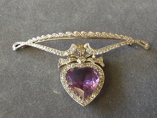 A fine quality bar brooch set diamonds and hung a heart shaped amethyst surrounded by diamonds