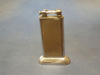 A Dunhill silver plated table lighter 4"