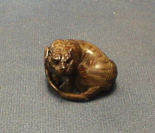 A reproduction carved hardwood Netsuke 1 1/2"