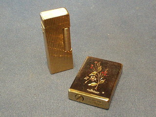 A Dunhill gold plated lighter and a Continental lighter