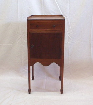 A Georgian mahogany pot cupboard with three-quarter gallery, fitted a drawer above a cupboard and on square tapering supports ending n spade feet 14"