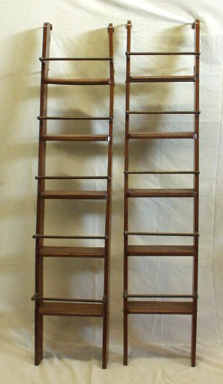 A pair of Georgian style mahogany and brass 5 tread library steps