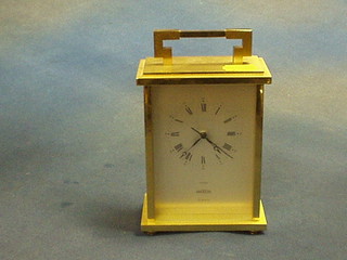An Angelus battery operated carriage clock