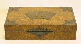 A rectangular figured walnutwood card box with gilt mounts and decorated pierced cards 11"