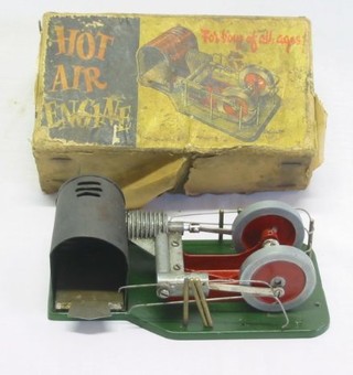 A hot air engine by Davis Charlton Ltd, cased
