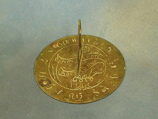 A circular "bronze" sun dial plated, marked 1750 8"