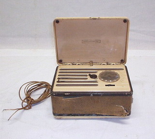 A G Marconi portable radio contained in a white Bakelite case 7"