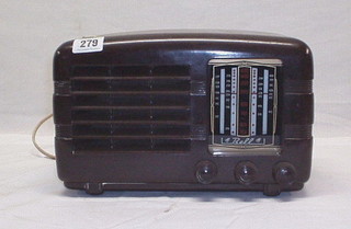 A Bell radio contained in a brown Bakelite case