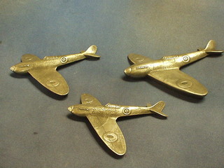 3 resin wall plaques in the form of spitfires in flight