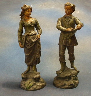 A pair of 19th Century painted spelter figures "Boy and Girl" 13"