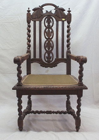 A set of 6 Victorian carved oak Carolean style high back chairs with pierced backs raised on spiral turned supports united by an H framed stretcher