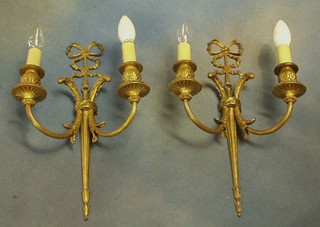 A pair of fine quality gilt metal twin light electric wall brackets