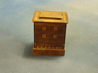 An early 20th Century wooden parquetry money box in the form of a house 5"