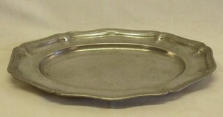 An oval pewter dish 12"