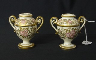 A pair of 18th Century Crown Derby porcelain twin handled urns with gilt banding (no lids, f and 4) 4"