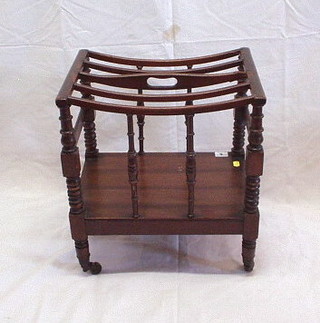 A 19th Century mahogany 4 section Canterbury raised on turned and block supports 16"