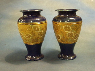 A pair of Royal Doulton vases of baluster form, the base marked Doulton Slater and impressed 7013 9"