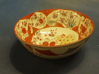 An Oriental Kutani porcelain bowl with panel decoration 9"