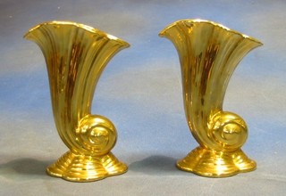 A pair of Royal Winton gilt painted Cornucopia vases, the bases marked Royal Winton 7"