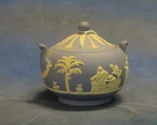 A modern circular twin handled Wedgwood blue jasperware urn and cover, base marked 30 3"