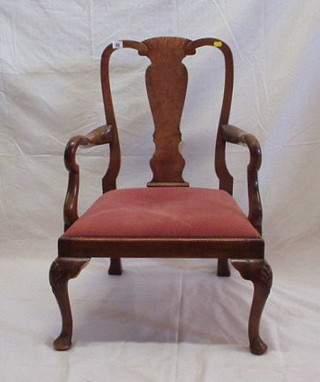 A Queen Anne style walnutwood splat back carver chair with upholstered drop in seat, on cabriole supports