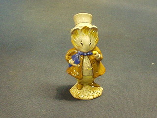 A Beswick Beatrix Potter figure "Amiable Guinea Pig", the base with gold back stamp (chip to the base)