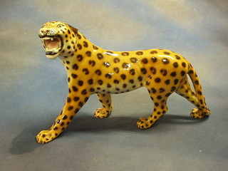 A Continental porcelain figure of a leopard