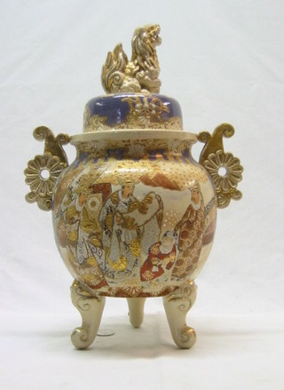 A late Japanese Satsuma pottery twin handled urn and cover, the finial in the form of a Dog of Fo 16"