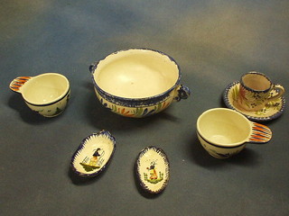 A Quimper ware twin handled dish, 2 Quimper ware rammekins, 2 pin trays and a cup and saucer